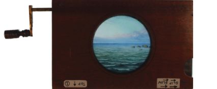 'Ship sailing towards rocks' [ship moves across, waves undulate] Maker unknown (7 x 4 1/2 x 3/4