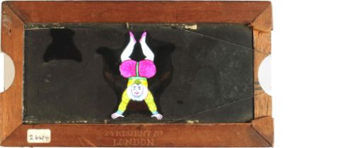 'Tumbling Clown' [legs move to three different positions] (6 7/8 x 3 5/8 x 3/8 inches), double slip