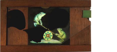 'Two frogs on seesaw' Maker unknown (7 x 4 x 3/8 inches), single slip