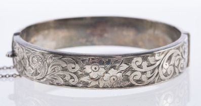 A silver bracelet.