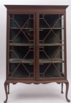 An Edwardian mahogany and glazed display