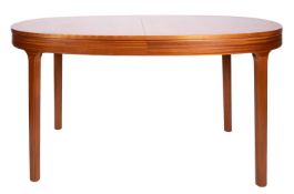 A teak extending dining table and six ch
