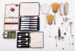 A pair of silver hair brushes and a silver hand mirror, together with a set of six silver cased