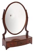 A Sheraton style dressing table mirror, the oval mirror in a mahogany crossbanded and box wood