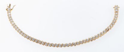 A tennis bracelet, 14 ct gold, set with cubic zirconia stones, box clasp with safety catches,