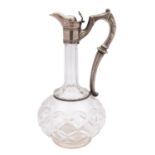 A late 19th century silver plated and cut glass claret jug, of classical form, with globular body,