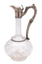 A late 19th century silver plated and cut glass claret jug, of classical form, with globular body,