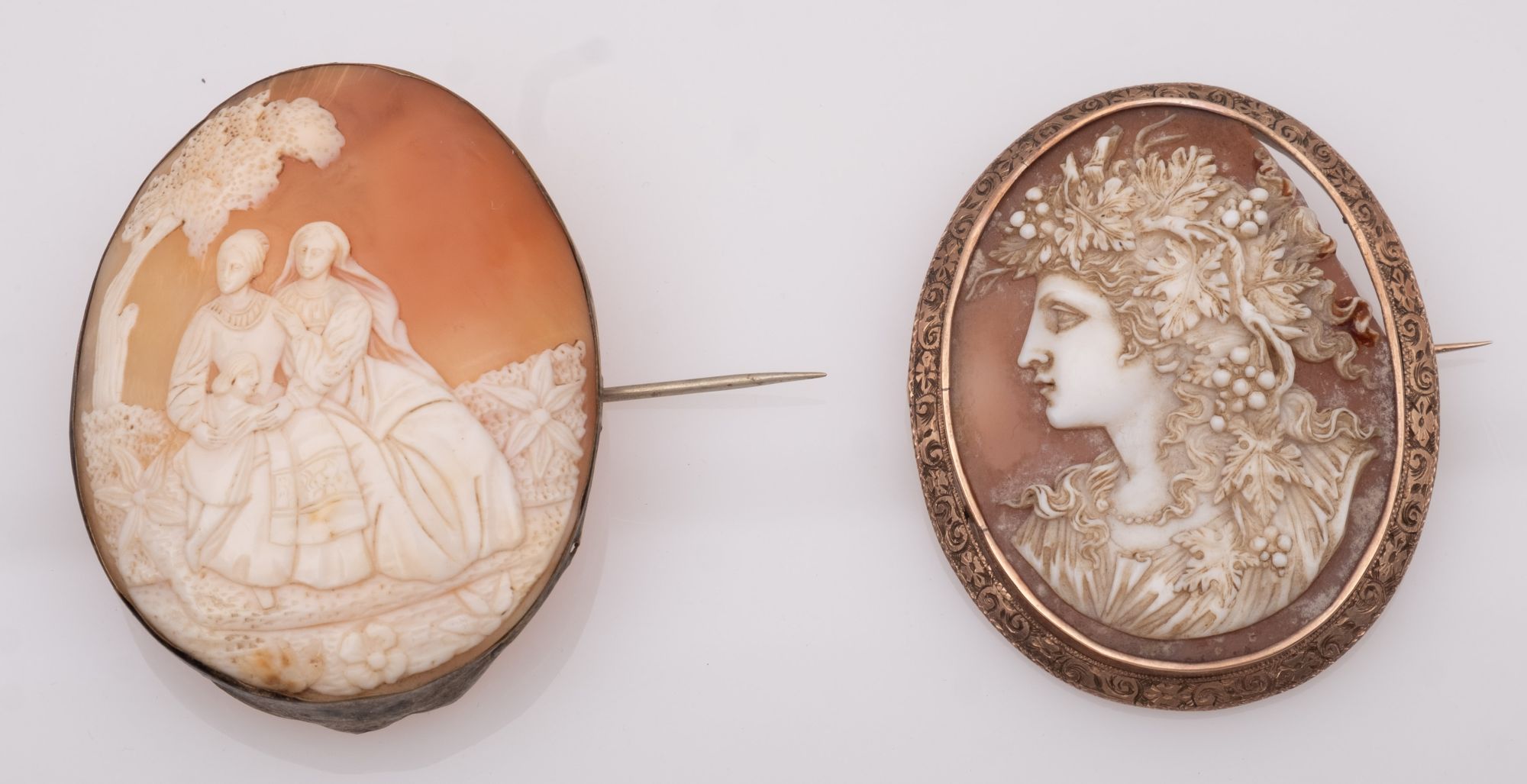 Two 19th century cameo brooches, one in unmarked gold frame with engraved decoration, another