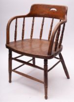 Two mahogany side chairs in George II style and an oak spindle back chair, 19th century.