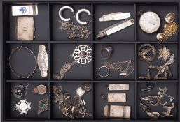 A group of mainly silver items including a box with raised decoration, silver money clips,mother