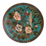 A Japanese cloisonné plate decorated with a crane amongst peony, 30cm diameter, late Meiji,