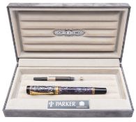 A Parker Duofold fountain pen. in blue marble with gilt clip and mounts, with Parker 18k 750 gold