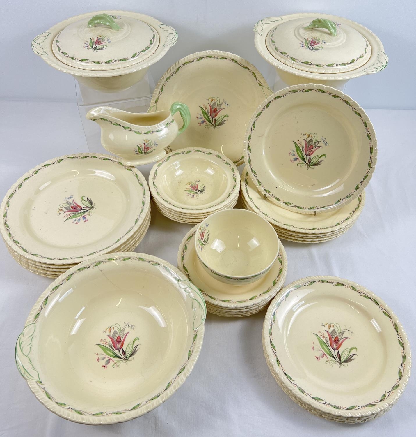 A 1930's New Hall, Hanley, Staffordshire Art Deco ceramic dinner service. With floral spray design