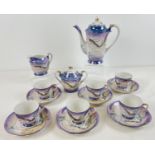A vintage Japanese ceramic Dragonware 6 setting coffee set with Geisha lithophane bases to cups.