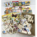 A collection of assorted vintage Brooke Bond tea cards together with 14 assorted collectors albums.