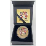 A limited edition colourised Disney Mickey & Minnie Mouse .999 fine silver 2 dollar coin. From the