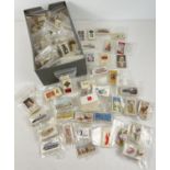 A box of over 1500 assorted vintage cigarette cards, bagged into part sets. Mostly John Players &