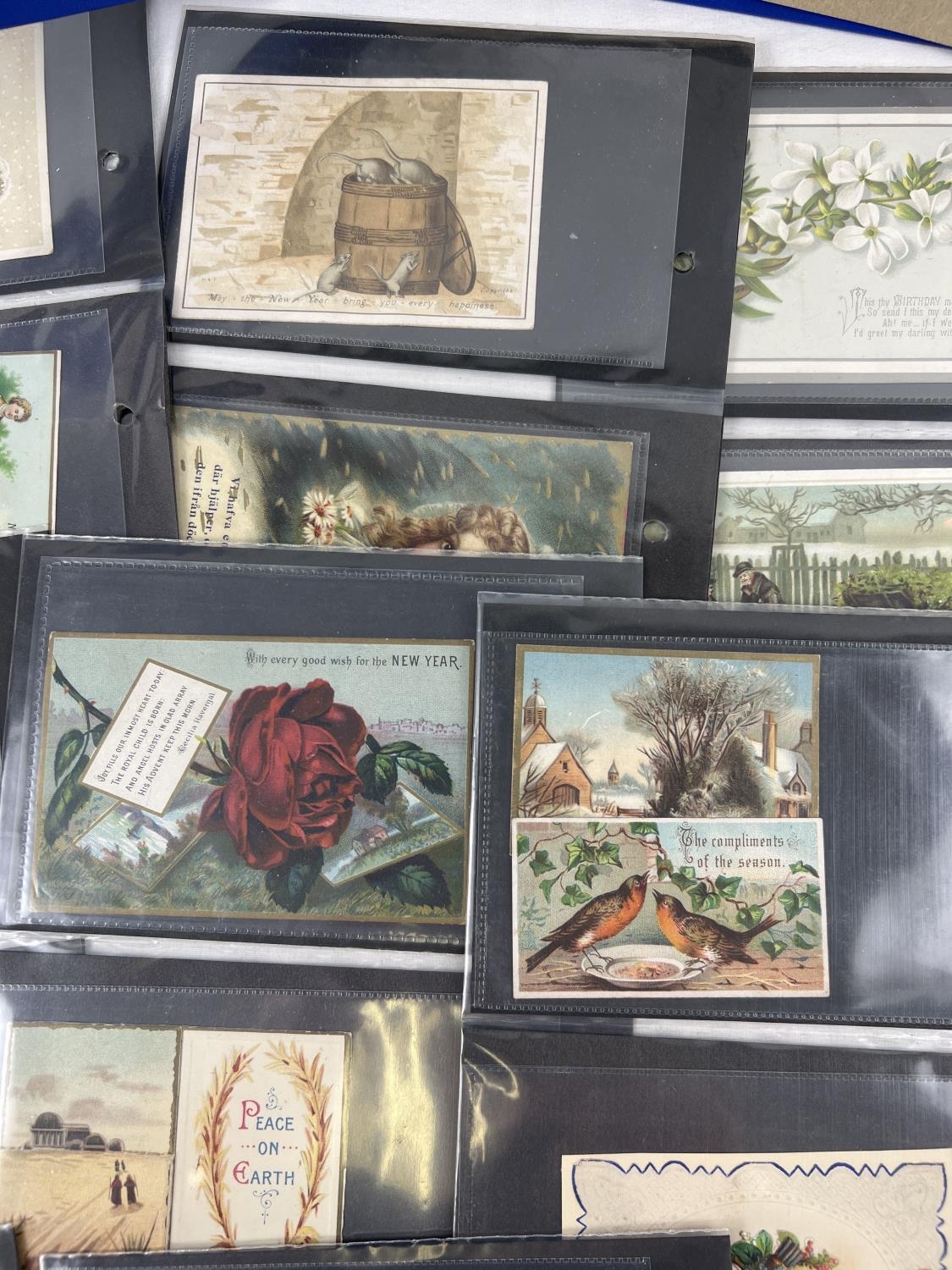 An album containing 83 assorted Victorian & Edwardian greetings cards. In carded plastic wallets. - Image 3 of 6