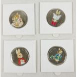 A set of 4 2018 Beatrix Potter 50p coins with coloured decals. In sealed card & clear plastic