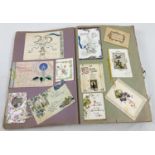 An album containing 230+ assorted Victorian & Edwardian greetings cards. Each card fixed onto