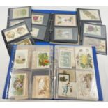 2 blue folders containing 160 assorted Victorian & Edwardian greetings cards. In varying styles