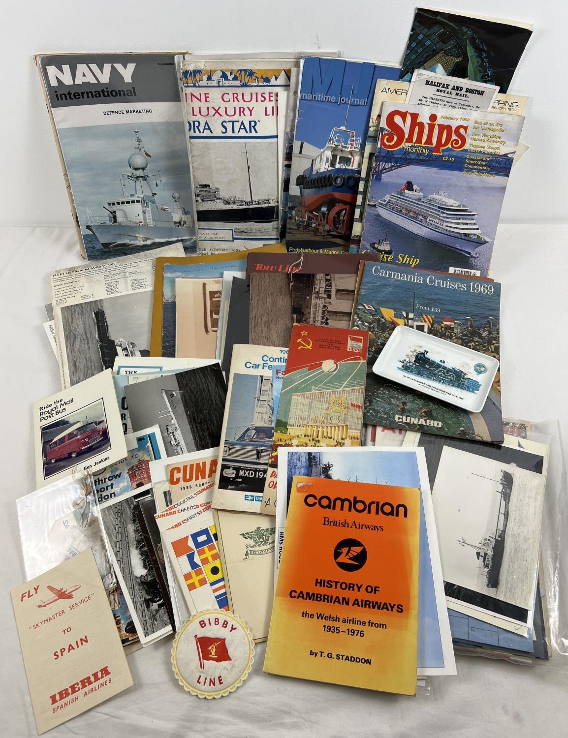 A box of assorted ephemera relating to shipping, airlines, train travel and cruises. To include