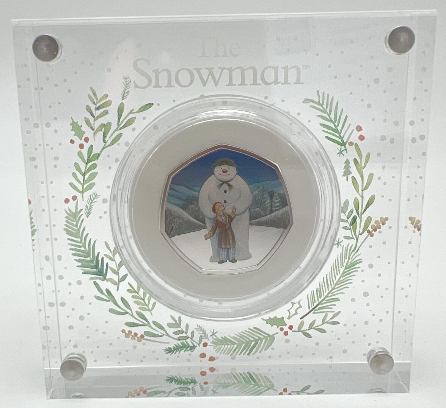 A 2019 limited edition "The Snowman" colourised silver proof 50p coin by The Royal Mint. Held within - Image 2 of 3