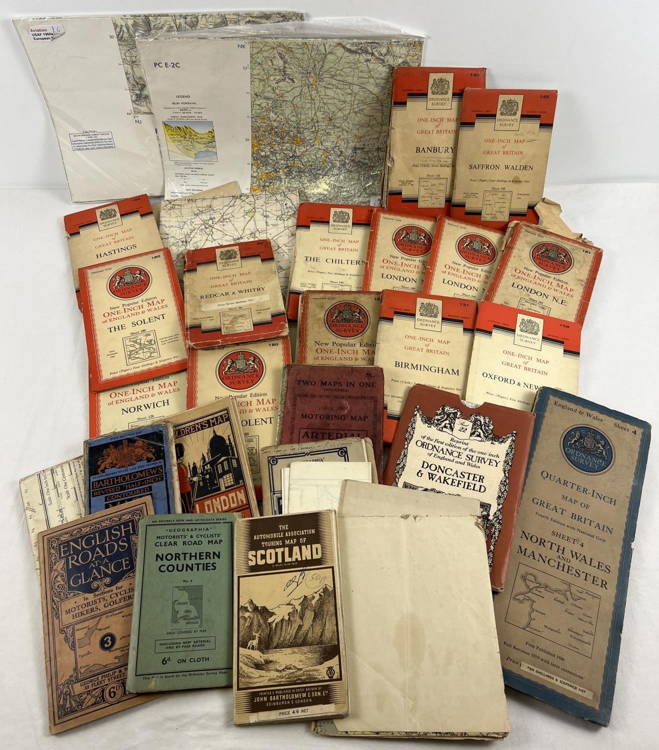 A collection of assorted vintage maps, to include 17 Ordnance Survey Maps. Lot also includes