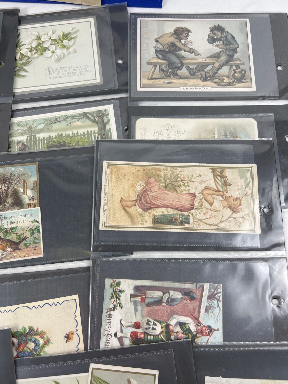 An album containing 83 assorted Victorian & Edwardian greetings cards. In carded plastic wallets. - Image 4 of 6