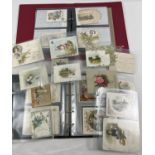 2 albums containing over 100 assorted Victorian & Edwardian greetings cards. In varying styles and