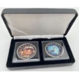 A 2018 boxed set of 2 colourised silver proof Canadian Halloween 5 dollar coins. Depicting a haunted