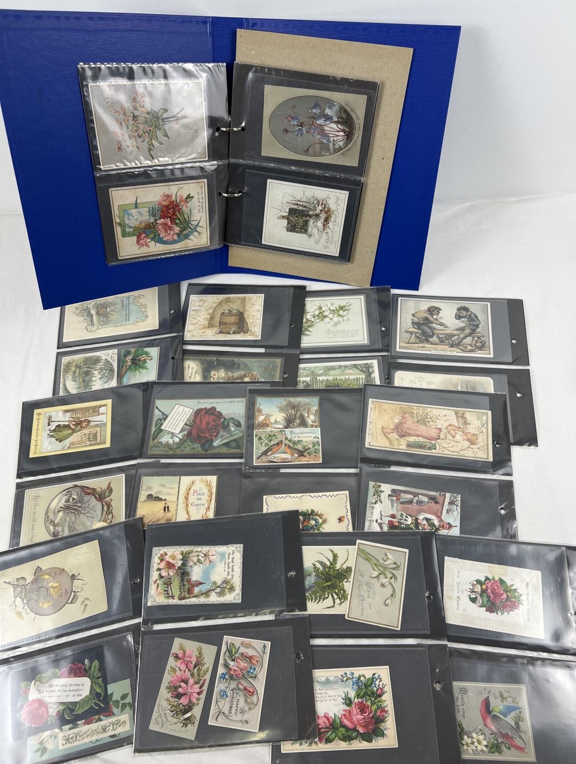 An album containing 83 assorted Victorian & Edwardian greetings cards. In carded plastic wallets. - Image 2 of 6
