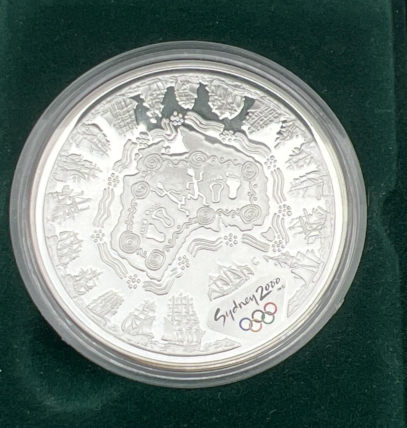 A collectors silver proof 5 dollar coin produced for the 2000 Sydney Olympics. Complete with clear - Image 2 of 2