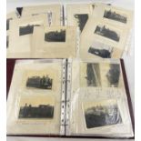 2 albums of vintage black and white photographs of steam trains.