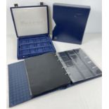 A coin collectors empty album with plastic coin display sleeves, by Lighthouse, together with "The