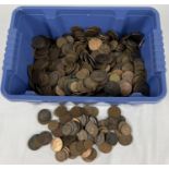 A tub of antique and vintage British coins. Pennies, half pennies, farthings and three pence