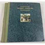 A vintage green coloured postcard album containing postcards from British and European destinations.