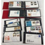 2 red albums containing 130+ assorted first day covers dating from 1940 through to the early 1980's.
