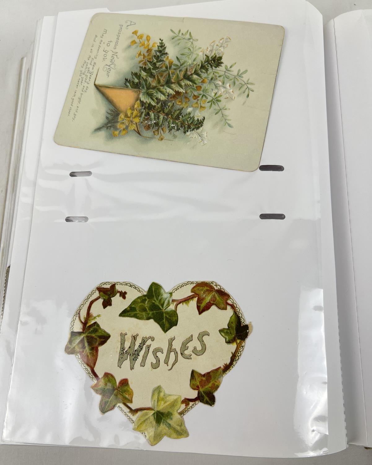A large album containing 163 assorted Victorian and Edwardian greetings cards. In varying shapes, - Image 8 of 9