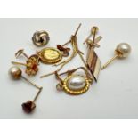 A small quantity of scrap gold earrings, some stone set. All marked or test as 9ct gold. Total