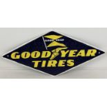 A diamond shaped painted cast iron Goodyear tyres wall plaque. Painted in blue, yellow & white and