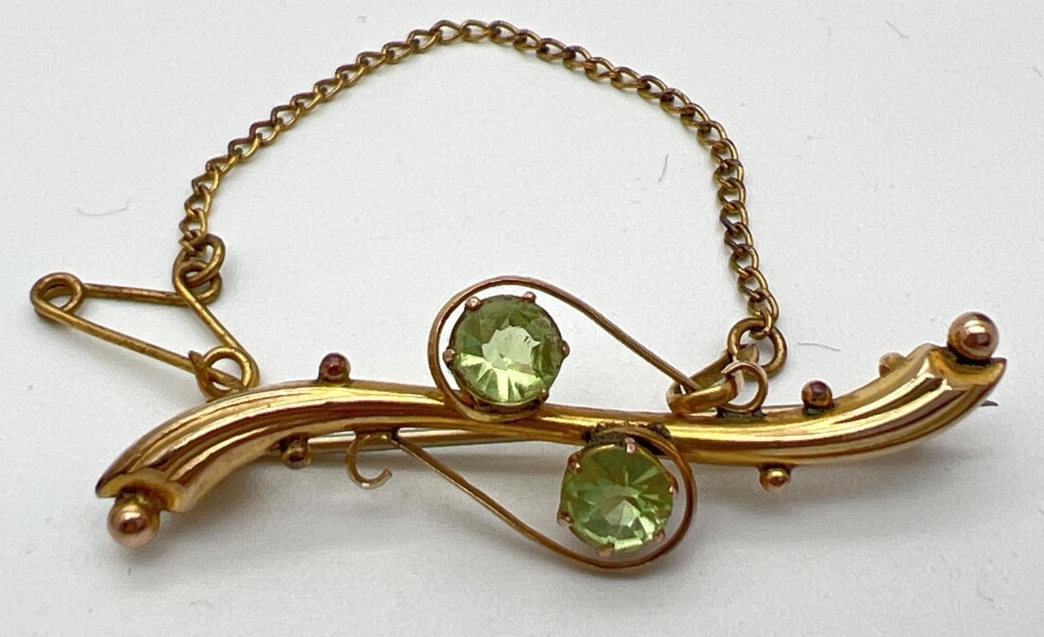 An Edwardian 9ct gold pin back brooch, set with 2 round cut pale green stones. Complete with - Image 3 of 3