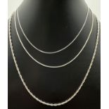 3 silver chain necklaces in varying lengths. A 20" rope chain with spring clasp, a 14" fine curb