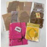 10 assorted vintage pairs of stockings in original packets.