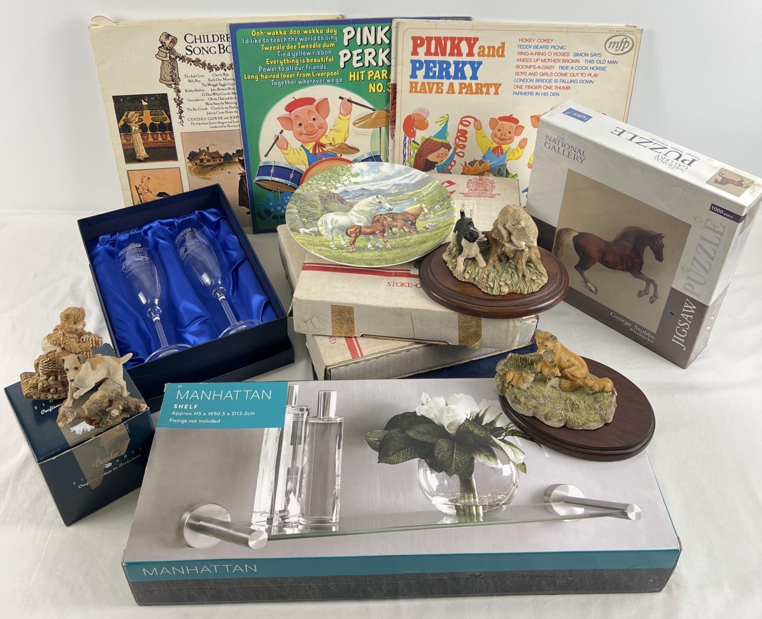 A box of mixed items to include resin animal figurines, collectors plates depicting rural scenes and