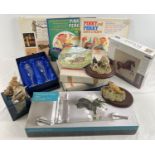 A box of mixed items to include resin animal figurines, collectors plates depicting rural scenes and