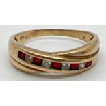 A 9ct gold crossover design channel set garnet and cubic zirconia eternity ring. Set with 5 square