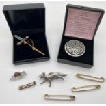 A small collection of costume jewellery brooches and pins. To include a sword shaped micro mosaic
