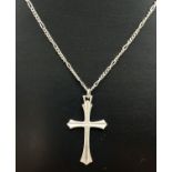 A vintage silver cross pendant on an 18" Figaro style chain with spring ring clasp. Silver marks