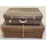 A vintage wooden bound travelling trunk with lift out interior tray and leather handles. Together